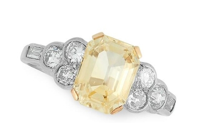 A YELLOW SAPPHIRE AND DIAMOND RING in platinum, set