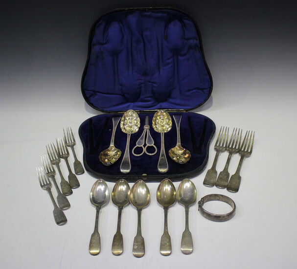 A collection of George IV and later silver Fiddle pattern cutlery, including table forks, dessert fo