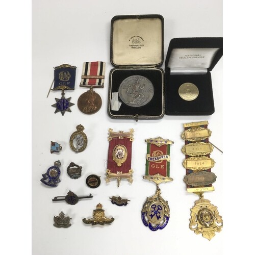 A collection of mainly Masonic related medals plus silver an...