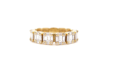 A diamond cluster eternity ring
