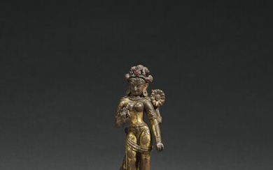 A gilt-copper alloy figure of Tara, Nepal, 13th/14th century | 尼泊爾 十三/十四世紀 鎏金銅度母立像, A gilt-copper alloy figure of Tara, Nepal, 13th/14th century | 尼泊爾 十三/十四世紀 鎏金銅度母立像