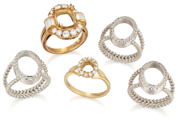A group of five diamond set ring mounts, comprising: three...
