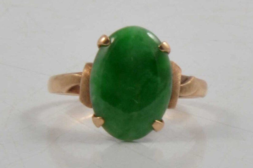 A jadeite dress ring.