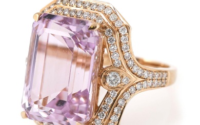 A kunzite and diamond ring set with an emerald-cut kunzite weighing app....