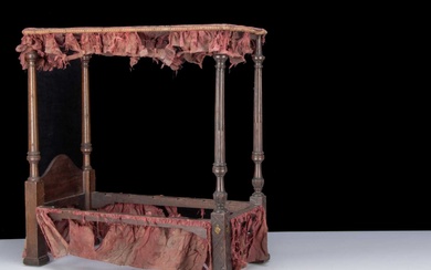 A large 19th century mahogany four poster bed
