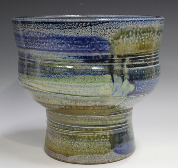 A large Jane Hamlyn studio pottery salt glazed footed bowl, decorated in shades of blue, green and b