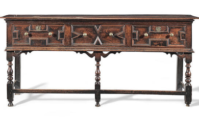A late 17th century oak low dresser
