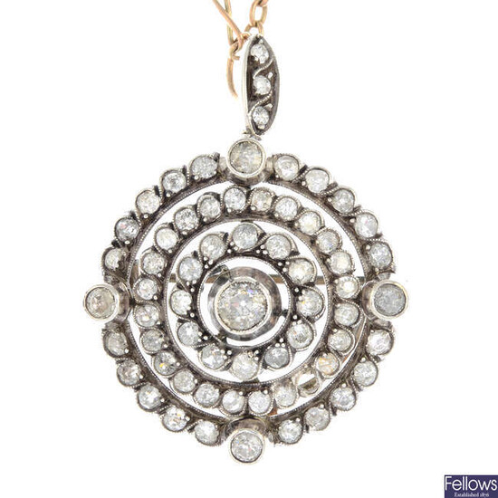 A late Victorian silver and gold old-cut diamond brooch/pendant with chain.