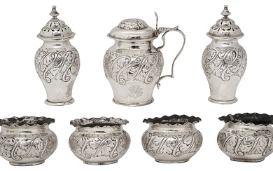 A late Victorian silver seven piece cruet set