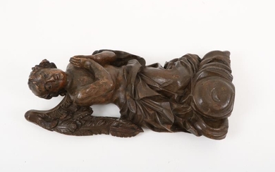 A lindenwood sculpture in the shape of an angel, ca. 1700, ofr earlier.