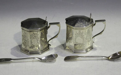 A near pair of early Victorian silver octagonal mustards, each with slightly domed hinged lid, with