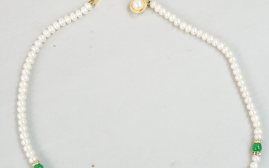 A necklace of cultured pearls decorated with jade, China.