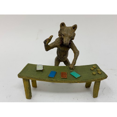 A novelty painted bronze figure, of a croupier at a table, 9...