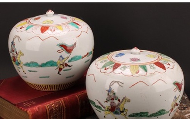 A pair of Chinese ovoid ginger jars and covers, decorated in...
