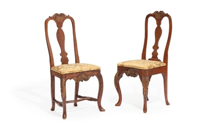 A pair of Danish 18th century partly gilded beech wood Baroque chairs. (2)