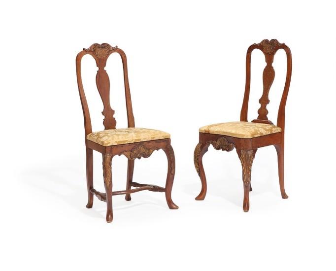 A pair of Danish 18th century partly gilded beech wood Baroque chairs. (2)