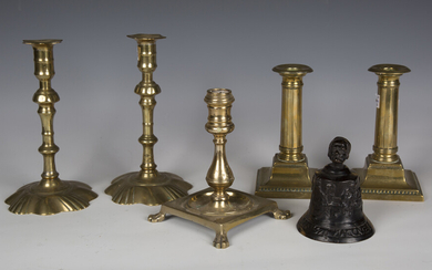 A pair of George III brass candlesticks, height 20cm, together with another pair of George III brass