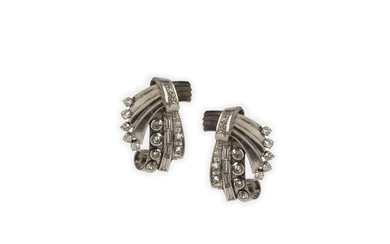 A pair of Retro diamond earrings, 1940s, of scroll design in polished platinum