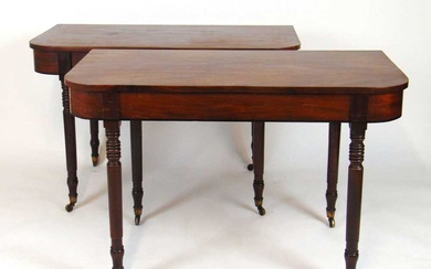 A pair of early 19th century mahogany and ebony strung...