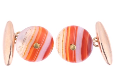 A pair of early 20th century 9ct gold banded agate panel cuf...