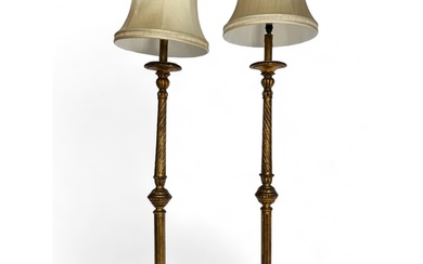 A pair of early 20th century Italian giltwood standard lamps...