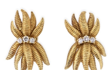 A pair of eighteen karat gold and diamond earclips,...