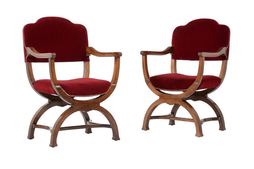 A pair of walnut and red velvet upholstered armchairs