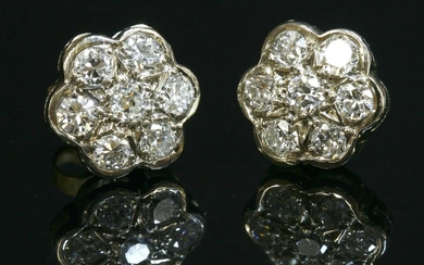 A pair of white gold diamond set daisy cluster earrings