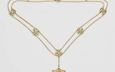 A probably English 9k gold and peridot pendant necklace.