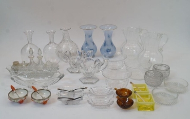 A quantity of glassware, to include: two hand-blown panelled jugs with scrolling S-shape handles, 16cm high; a cut glass five-section cruet stand with removable salt, pepper and vinaigrette stands, 23cm long; two twin handled hexagonal trophy cups...
