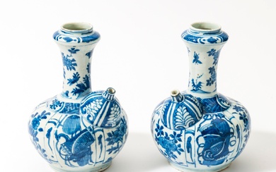 A rare pair of identical Chinese blue and white 'kraak' porcelain kendi's