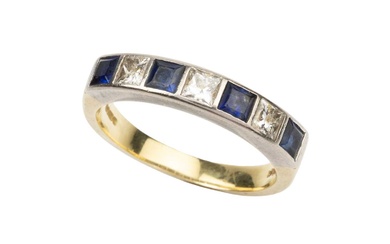 A sapphire and diamond dress ring, set alternately with four...