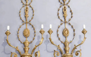 A set of four George III Adam style gilded wood and composition...