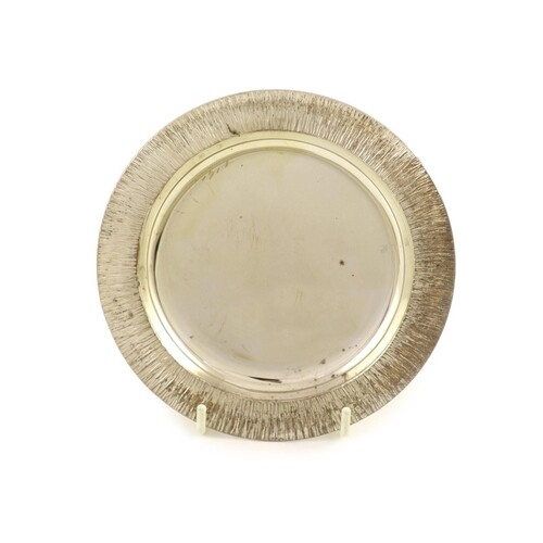 A silver small circular dish, by Simon Benney, maker's mark ...