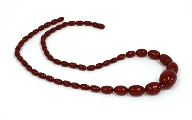A single row graduated cherry coloured Bakelite bead necklace
