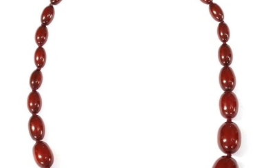 A single row graduated oval cherry coloured Bakelite bead necklace