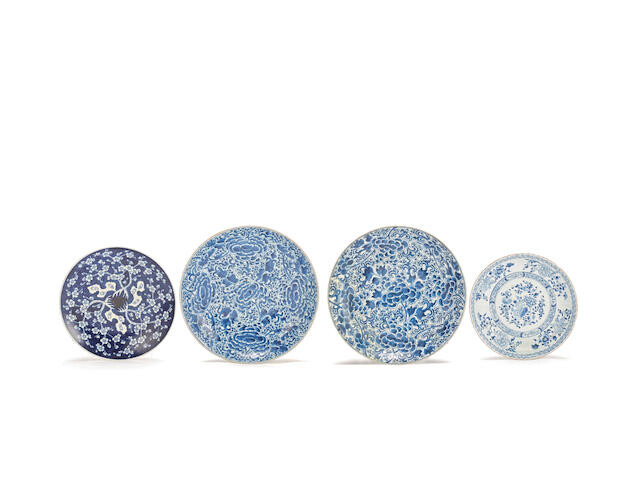A small collection of four blue and white 'floral' dishes