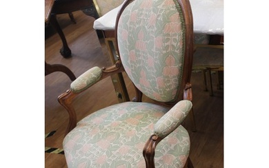 A stained-oak 18th century-style elbow chair on slender Fren...