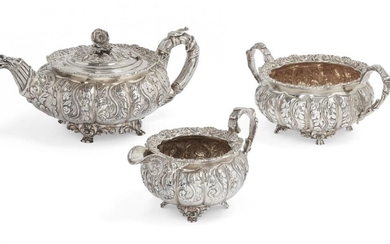 A three-piece tea set, comprising a George IV melon shaped...