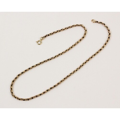 A yellow metal box-link chain, with spring ring fastener sta...