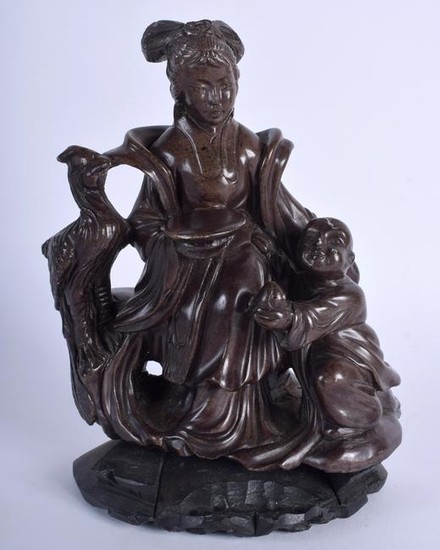 AN EARLY 20TH CENTURY CHINESE SOAPSTONE CARVED GROUP
