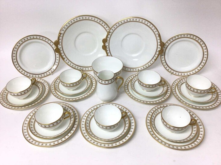 Adderleys Ltd. porcelain teaset, Rouen pattern eleven place setting with two cake plates, milk jug and sugar bowl, each decorated with borders of fleur-de-lis (37 pieces)