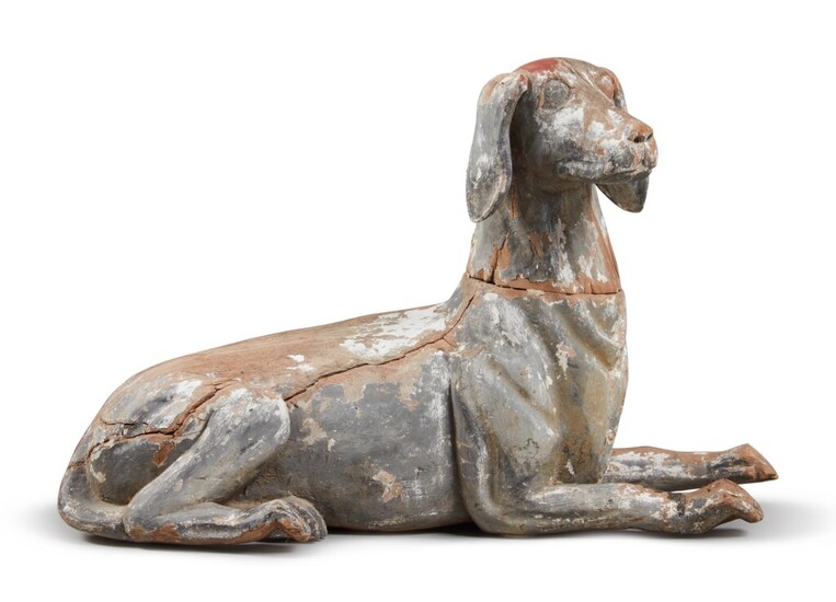 American White and Black-Painted Carved Wooden Reclined Dog, Late 19th or Early 20th Century