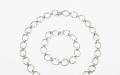 An 18 carat white gold and diamond necklace...
