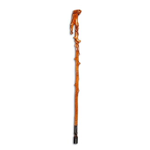 An Edwardian carved naturalistic walking stick The upper end...