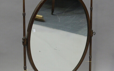 An Edwardian mahogany oval swing frame mirror of large proportions, height 89cm, width 60cm, togethe