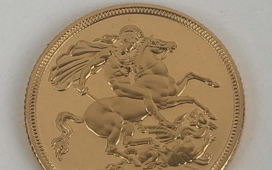 An Elizabeth II gold proof sovereign, 2001, cased with paper...