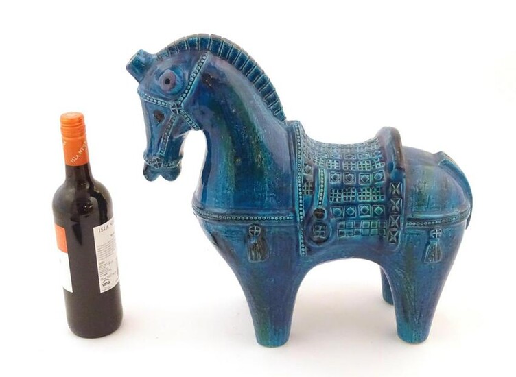An Italian model of a stylised horse with a turquoise