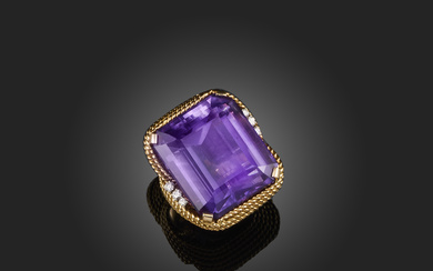 An amethyst and diamond cocktail ring, France, third quarter 20th century claw-set with a large