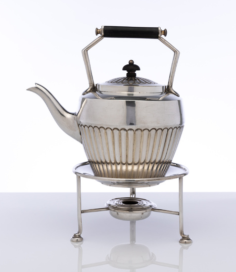 An antique silverplate half fluted tea kettle on stand with...